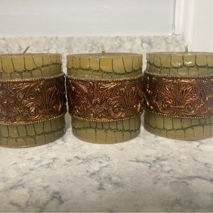 3 for $25 Item Set of 3 green and brown candles.